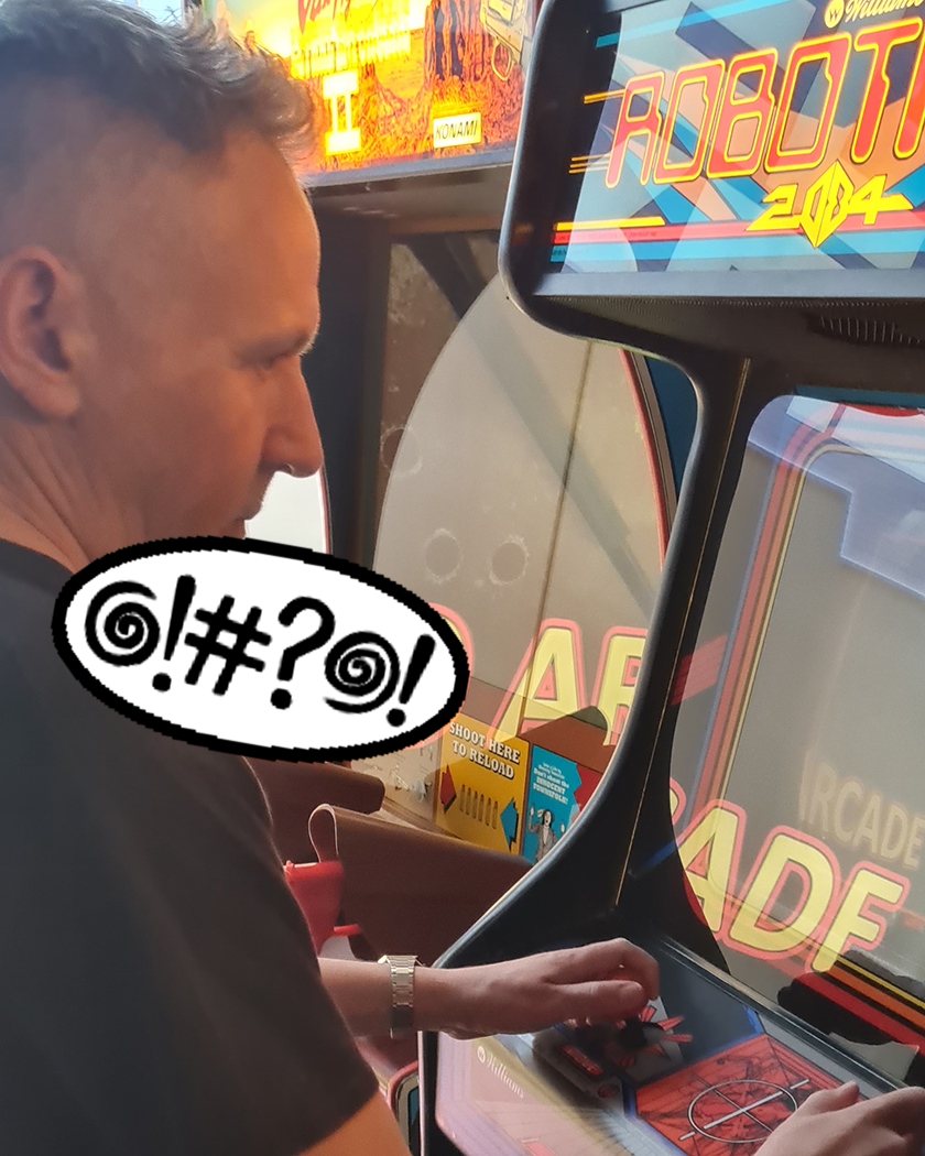 Aiden Smith playing Robotron 2084 in an arcade